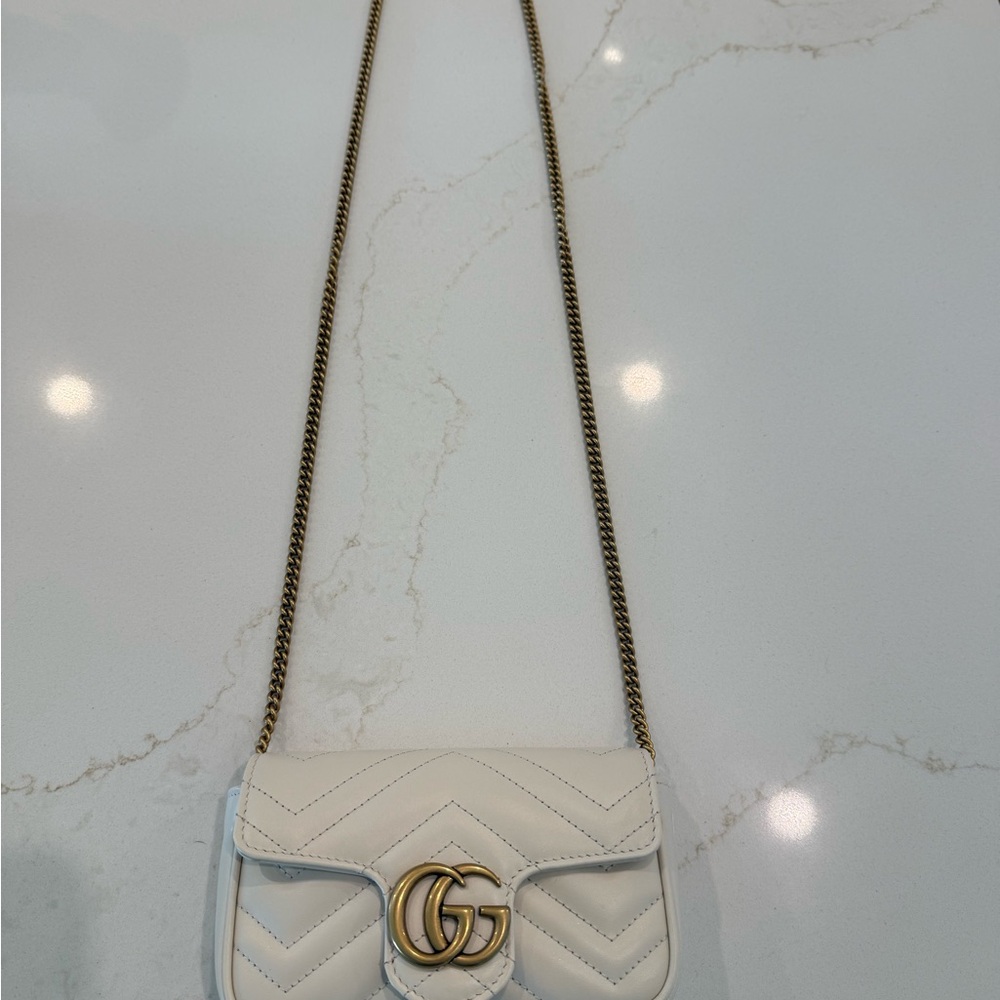 Authentic: Gucci White Crossbody Bag with Gold GG Logo